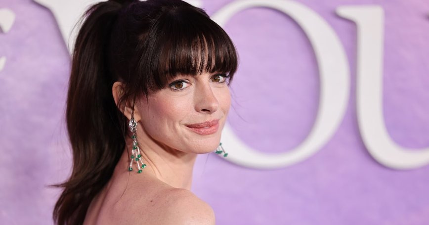 Anne Hathaway Elevates Office Style by Layering Lingerie with Menswear