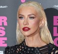Christina Aguilera Stuns in Sheer Minidress with Festive Flair