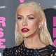 Christina Aguilera Stuns in Sheer Minidress with Festive Flair