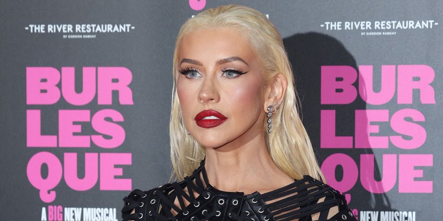 Christina Aguilera Stuns in Sheer Minidress with Festive Flair