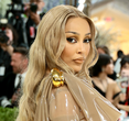 Doja Cat's Daring Fashion Moment: Silicone Dress Takes Center Stage