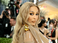 Doja Cat's Daring Fashion Moment: Silicone Dress Takes Center Stage