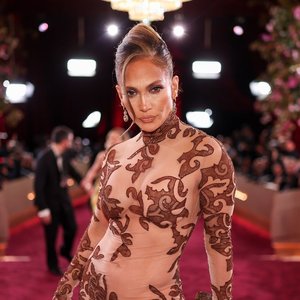 Jennifer Lopez Stuns in Bold Braless Look with Ultra-Plunging Leather Blazer