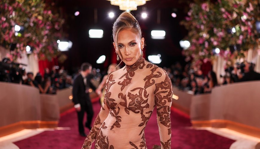 Jennifer Lopez Stuns in Bold Braless Look with Ultra-Plunging Leather Blazer