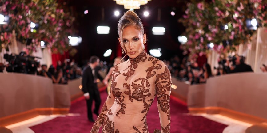 Jennifer Lopez Stuns in Bold Braless Look with Ultra-Plunging Leather Blazer