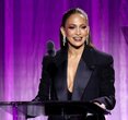 Jennifer Lopez Rocks the Red Carpet in Bold Blazer and Slip Dress Combo
