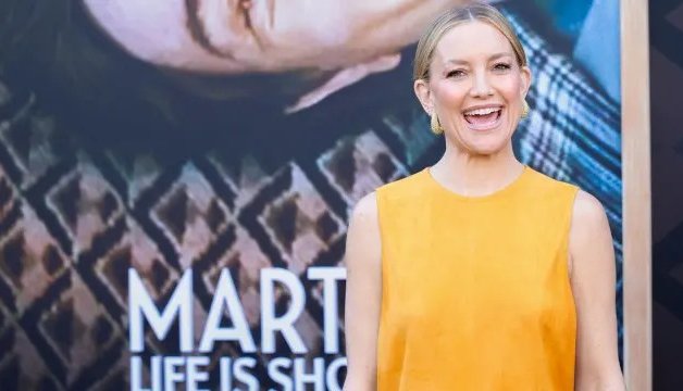 Kate Hudson Dazzles in Bold Yellow Cutout Dress at Premiere