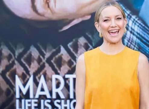 Kate Hudson Dazzles in Bold Yellow Cutout Dress at Premiere