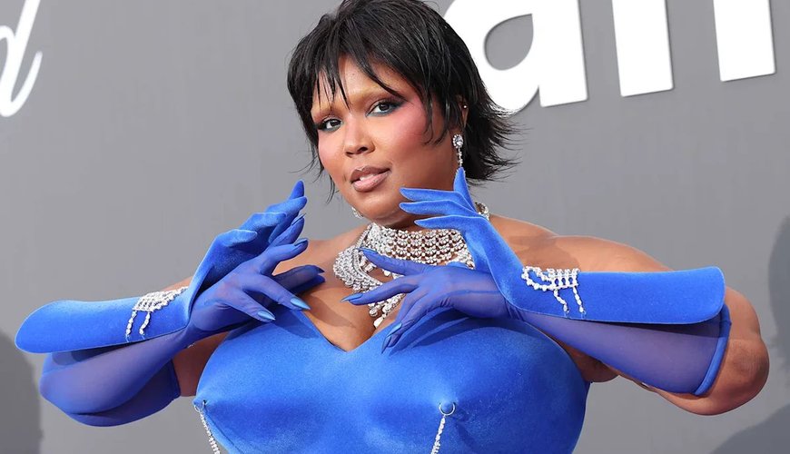 Lizzo Dazzles in Bold Nipple Necklace Gown at Cannes amfAR Gala