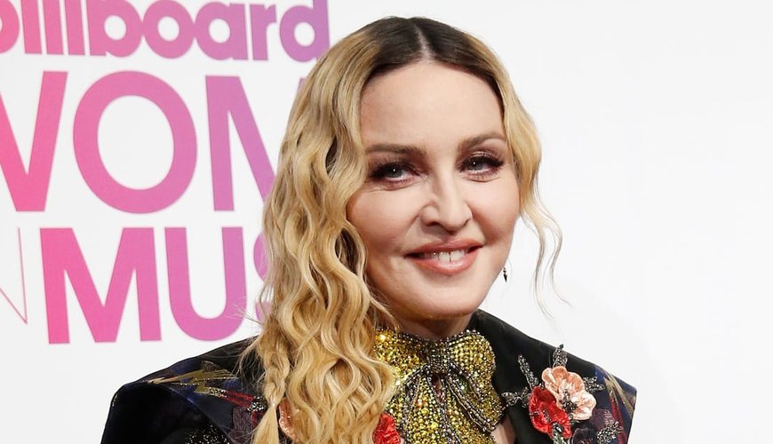 Madonna Trades Stilettos for Sneakers After Knee Woes