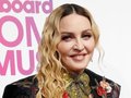 Madonna Trades Stilettos for Sneakers After Knee Woes