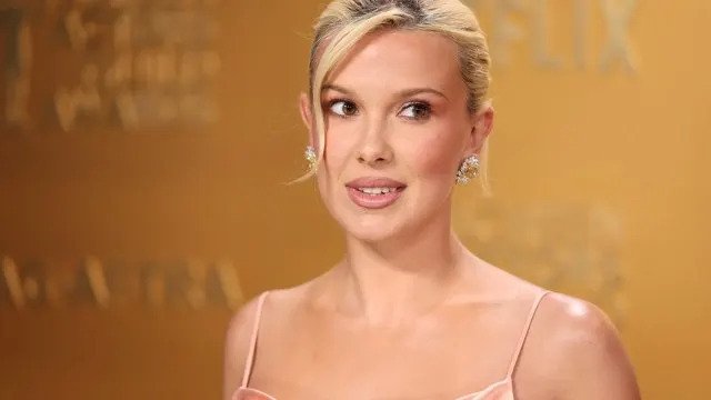 Millie Bobby Brown Stuns with Bold Bikini and Sarong Style