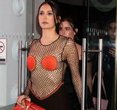 Nina Dobrev Turns Heads in Daring Fishnet Ensemble