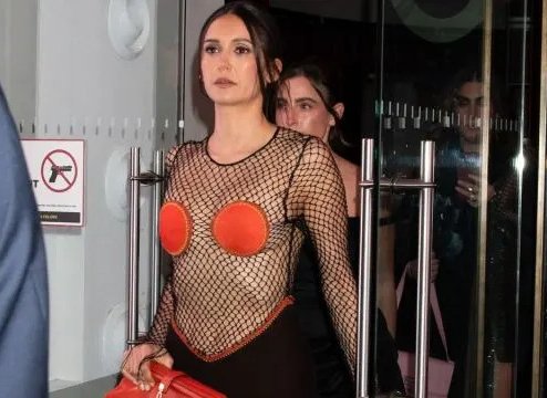 Nina Dobrev Turns Heads in Daring Fishnet Ensemble