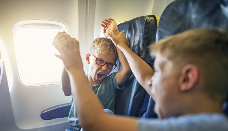 Parents Fly First Class, Leave Kids to Fend for Themselves in Coach