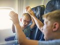 Parents Fly First Class, Leave Kids to Fend for Themselves in Coach