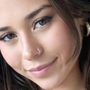 Sophie Rain Shines in Gold Bikini While Speaking Her Mind