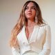 OnlyFans Star Natalie Reynolds Takes a Splash with Sold-Out Bathwater